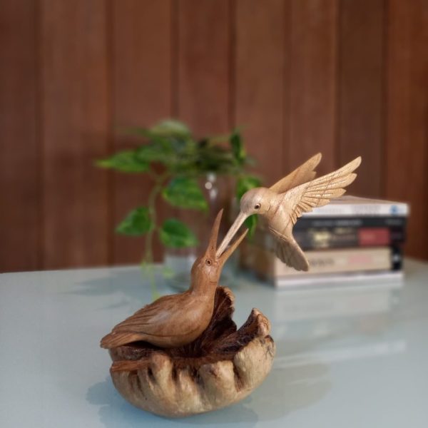 bird feeding chick wood statue – love and care sculpture
