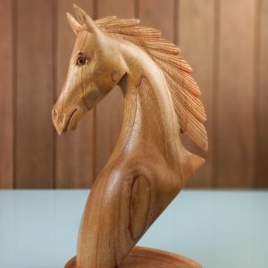 handcrafted wooden horse statue