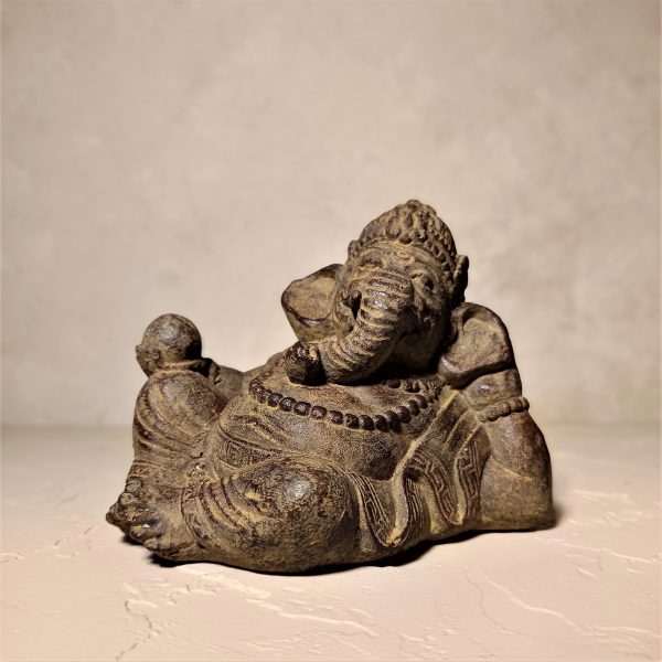 Relaxed Ganesha statue hand-painted in Bali – symbolic spiritual table decor